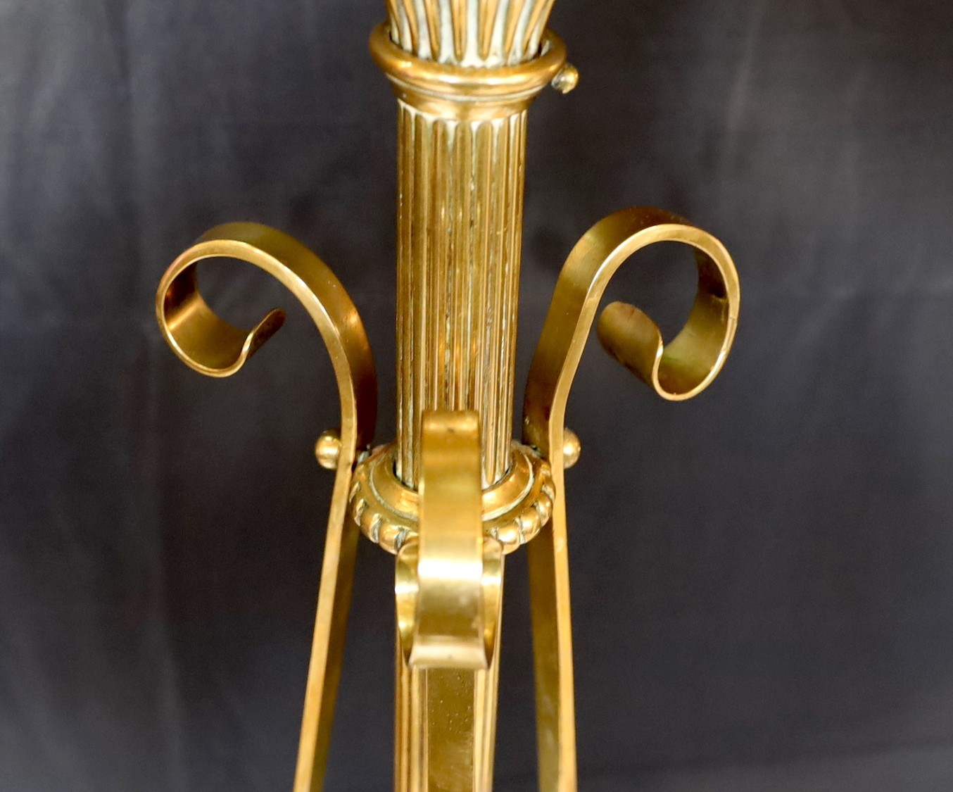 A late 19th century English brass telescopic lamp standard, height 146cm. width of base 43cm.